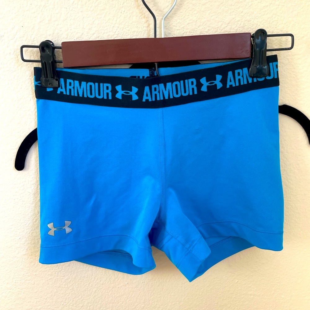 Two pair of shorts, blue pair xs Purple pair small